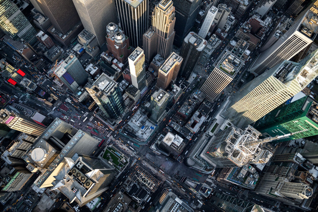 Aerial view of a dense city, for the Physical Security use case, protecting critical sites and travelers.
